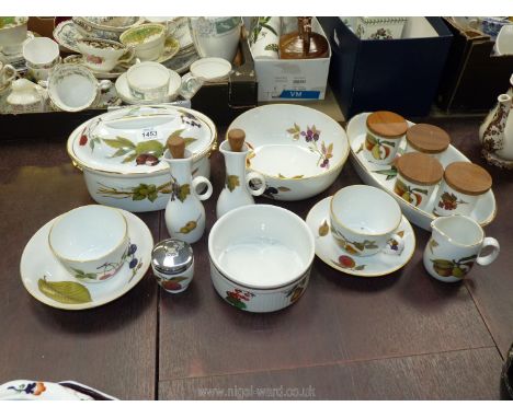 A quantity of Royal Worcester 'Evesham' china including serving dishes, oil and vinegar jugs, storage pots, etc.