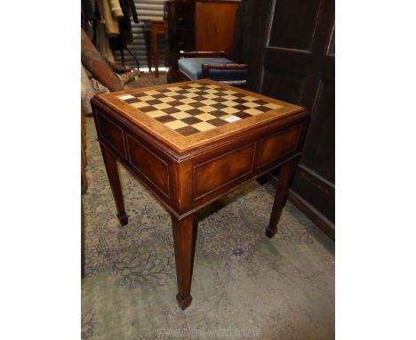 A most appealing Games Table of mixed woods having a chequer/chess board top with burrwood banding, reversible top having too