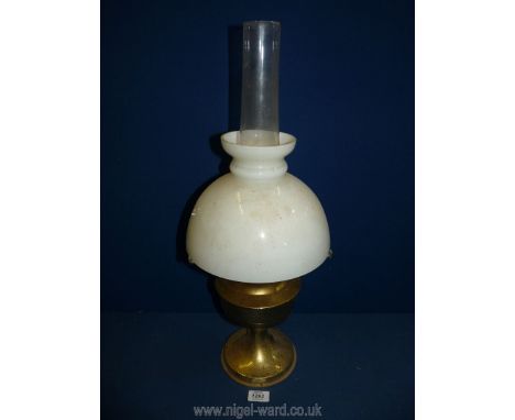 A brass based Aladdin oil Lamp with white shade and chimney, 24" tall.