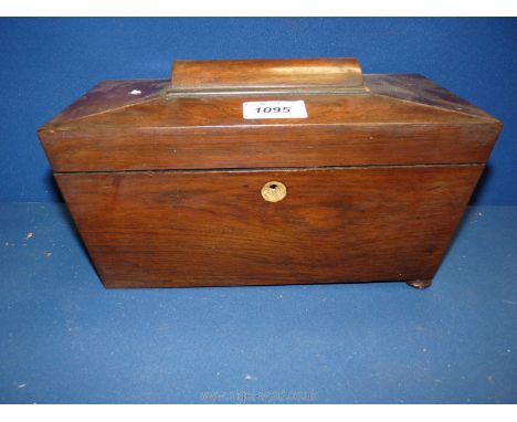 A Victorian sarcophagus tea Caddy in flame Mahogany with internal fittings,11" wide x 5 1/2" deep x 5" tall. (exterior a/f)