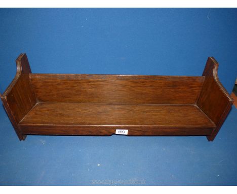 An Oak book trough, 25" long.