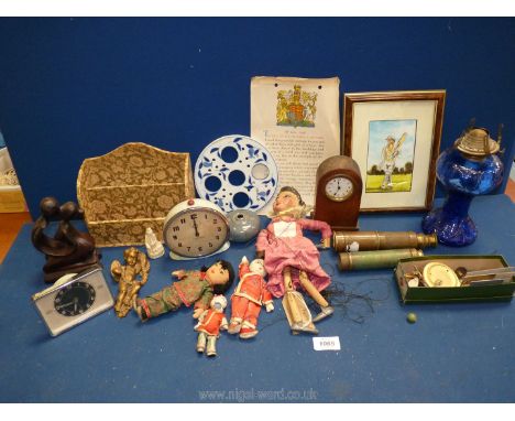 A quantity of miscellanea to include vintage puppet, two telescopes, clocks, oil lamps, etc.,