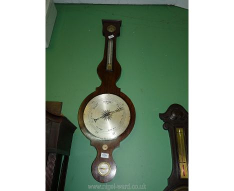 A four point Walnut Banjo barometer by ''Boorman, Gravesend'' having barometer, hygrometer, thermometer and level, 41'' long,