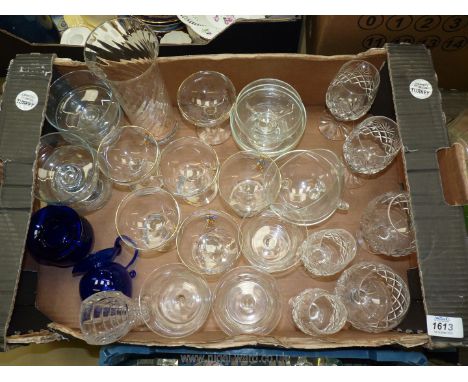 A quantity of glass ware including two Royal Doulton brandy and champagne glasses, glass goblets and Bristol blue jug and bow