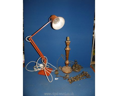 A red angle poise lamp by Herbert Terry &amp; Sons Ltd Redditch, plus a wooden gold coloured table lamp with brass fittings, 