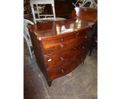 A compact Mahogany Chest of two long and two short Drawers standing on shaped bracket feet with a shaped apron, 35 1/2'' wide