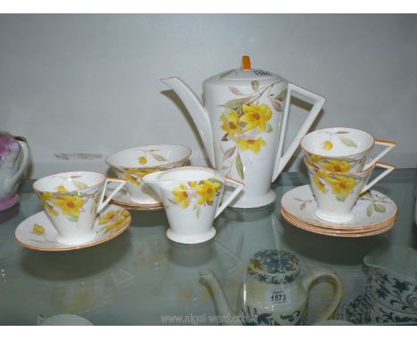 A very pretty Shelley part coffee set with Art Deco handles and orange rim, one cup with hairline crack, Reg.no. 756533.