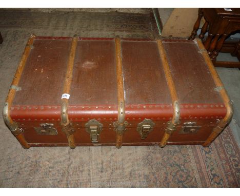 A bentwood bound Travel Trunk with an interior shelf. 92" wide x 191/2" deep x 12" high.