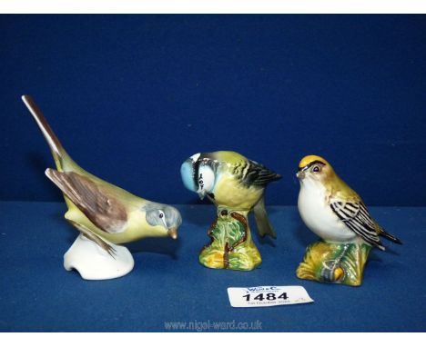 Two Beswick birds including Goldcrest (beak a/f) and Blue Tit, plus a Goebel bird.