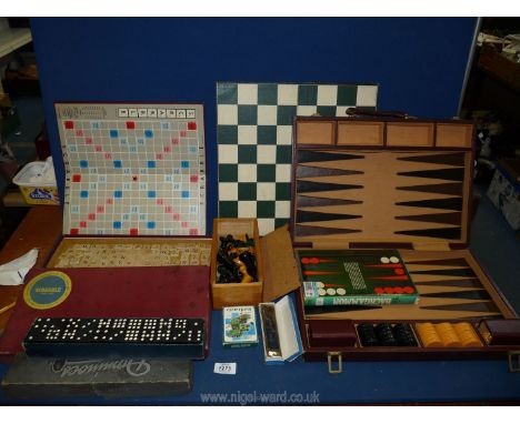 A cased set of Backgammon, a Victory mouth organ, playing cards, Scrabble, Chess, Dominoes, etc.