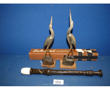 An English Dolmetsh recorder retailed by Boosey and Hawkes in original box and linen sleeve together with two late 19th centu