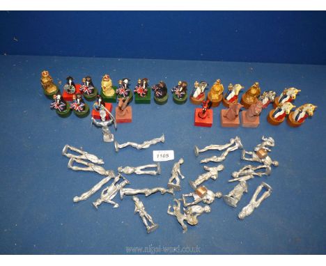 A quantity of metal figures and painted chess pieces in the form of horse's heads, 2 1/4'' high.