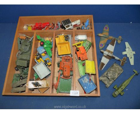A quantity of farm machinery including David Brown tractor, Massey combine, Class combine, Dinky dump truck, trailers and arm