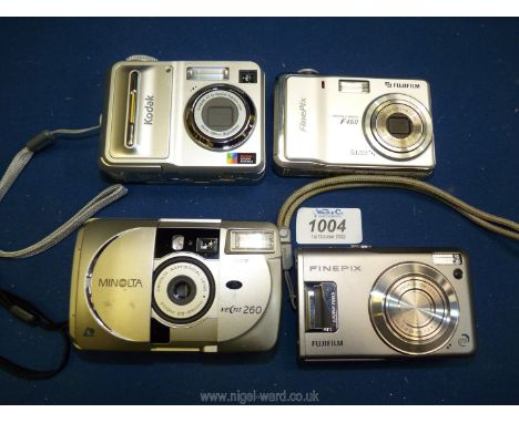 Four digital cameras including Kodak Easyshare C653, a Finepix Fujifilm F460, 5.1 mega pixels, boxed Minolta Vectis 260, and 