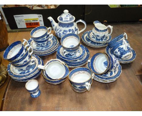 A quantity of blue and white china including 'Booths' 'Real Old Willow' cups, saucers, and tea plates, a Broad stone Willow t