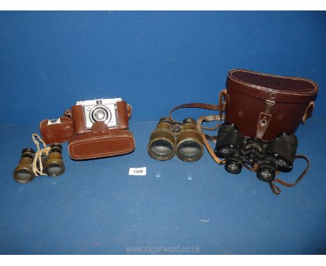A pair of Stepruva Ross London 9 x 35 binoculars in leather case, a pair of brass binoculars (in need of restoration), an Ilf