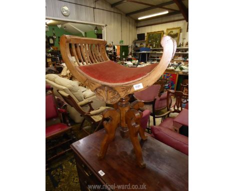 A most unusual Satinwood Stool having slatted sides to the blush pink dralon upholstered seat, a turned pillar with four fret