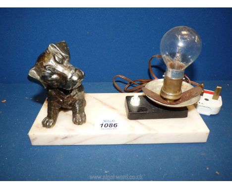 An Art Deco style desk Lamp with a marble base having a spelter terrier puppy figure (no shade), 8 3/4" x 3 1/2" high.