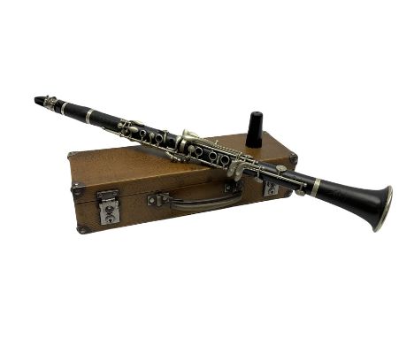 Buffet Crampon Paris African blackwood four-piece clarinet with nickel fittings, impressed 'BCPB 1937', multiple stamps for '