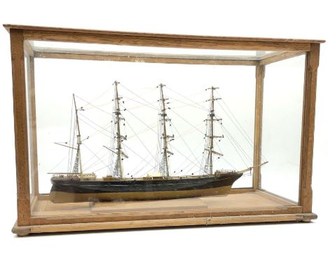 Model of a four masted sailing ship, with rigging in an oak framed case with four glazed sides and top, H28cm, L44cm, D21.5cm