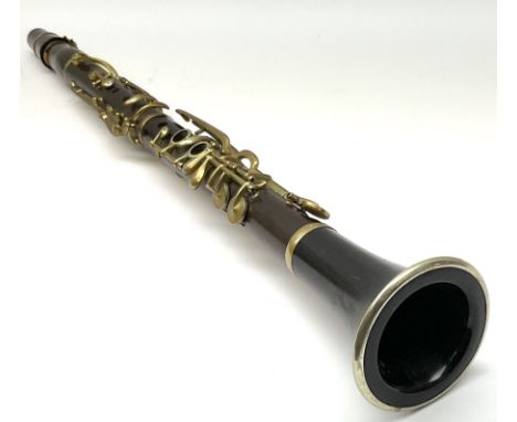 Early 20th century hardwood four-piece clarinet with brass plated nickel mounts L64cm