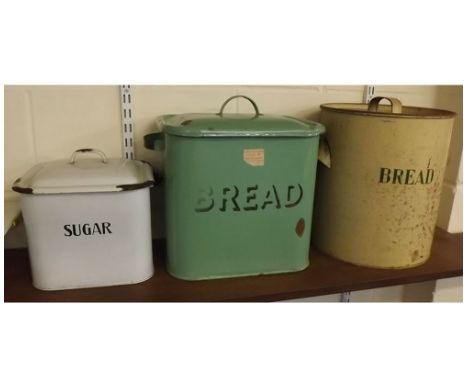 Three vintage enamel lidded containers, two of square form for bread and sugar, and a further circular covered bread containe