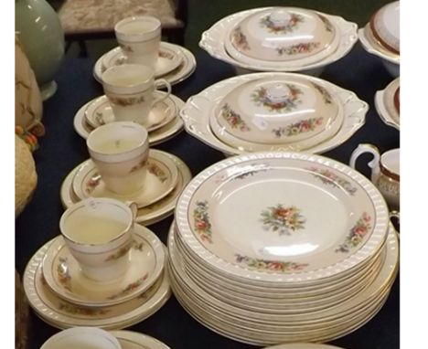 Barrett's (Staffordshire) early 20th century tea/dinner service decorated with floral designs comprises tureens, plates in si