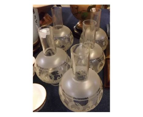 Collection of five vintage glass lamp chimneys, 9" high 