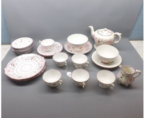 Collection of various Victorian pink lustre wares, comprises tea pot, various cups and saucers, slop bowl, sugar bowl, plates