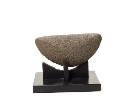 A LARGE NEOLITHIC VOLCANIC STONE MORTARTenere Region, Sahara, Niger, Neolithic period (ca. 6th to 4th millennium BC). The hea