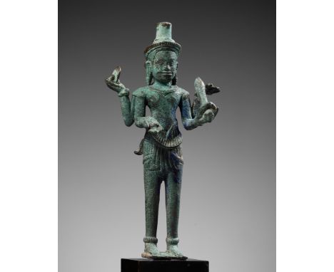 A BRONZE FIGURE OF VISHNU, ANGKOR PERIOD, KHMER EMPIRE, 12TH-13TH CENTURYWell cast standing in samapada on a square base, his