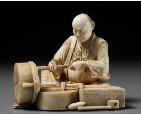 BISEI: AN IVORY OKIMONO DEPICTING A MILLER AT WORKBy Bisei, signed BiseiJapan, Meiji period (1868-1912)The miller seated on a