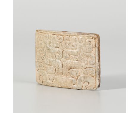 A JADE 'TAOTIE' PLAQUE, EASTERN ZHOU DYNASTYChina, 770-221 BC. Of rectangular form, finely carved in relief with a central ta