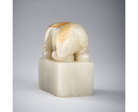 A PALE CELADON JADE 'ELEPHANT' SEAL, QING DYNASTYChina, Qing dynasty (1644-1912). The rectangular seal surmounted by a finial