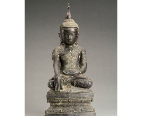 A BURMESE BRONZE FIGURE OF BUDDHA, 19TH CENTURYBurma/ Myanmar, Mandalay period. Cast seated in dyhanasana on a tiered base, h