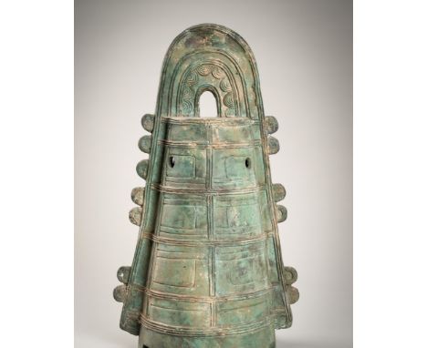 A LARGE BRONZE DOTAKU (BELL), LATE YAYOI PERIODJapan, 1st-3rd centuryThe hollow body designed with rows of horizontal and ver