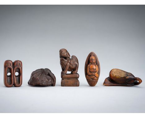 A GROUP OF FIVE WOOD NETSUKEUnsignedJapan, 19th centuryThe first wood netsuke carved as a joined pair of flat shoes with two 