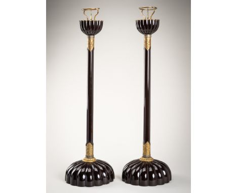 A PAIR OF BLACK LACQUERED CANDLESTICKSJapan, early Meiji period (1868-1912)Each in black over red lacquer with engraved coppe