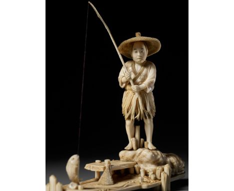 SEISHU: A RARE IVORY OKIMONO OF A FISHERMAN REELING IN A FISHBy Okawa Seishu, signed Seishu sakuJapan, Tokyo, late 19th centu