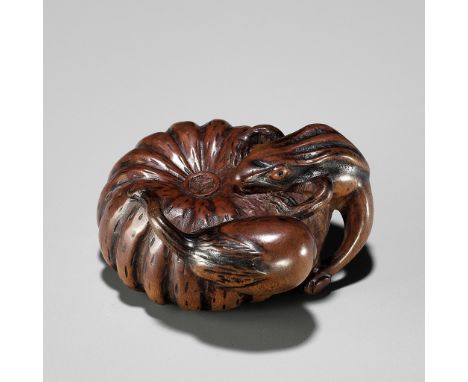 TOMONOBU: A WOOD NETSUKE OF A FROG, NASUBI AND PUMPKINBy Arima Tomonobu, signed Tomonobu 友信Japan, Nagoya, 19th century, Edo p