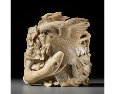 TANAKA REIGYOKU: A FINE IVORY TUSK BOX AND COVER DEPICTING A SNAKE EATING A SPARROWBy Tanaka Reigyoku, signed with two seals 