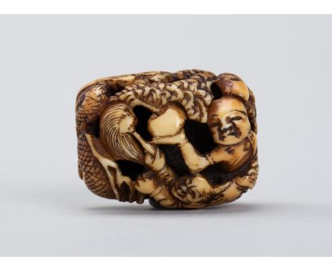 A WALRUS TUSK RYUSA MANJU NETSUKE OF RAKAN HADAKA SONJA CONJURING A DRAGONJapan, Edo period (1615-1868)Carved in openwork and