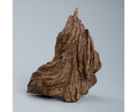 AN AGAR WOOD SCHOLAR'S ROCK, QINGChina, Qing dynasty (1644-1912). The abstract sculpture carved from chenxiangmu (agarwood) a