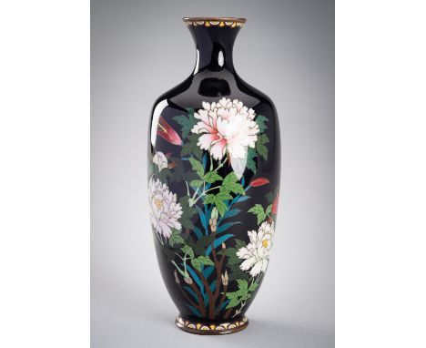 A BLACK CLOISONNE VASE WITH FLOWERSJapan, Meiji period (1868-1912)Standing on a short spreading foot and rising to a rounded 