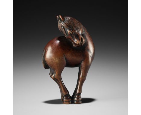 AN UNUSUAL WOOD NETSUKE OF A HORSEUnsignedJapan, 19th century, Edo period (1615-1868)The large and unusual wood netsuke finel