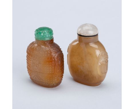 A GROUP OF TWO AGATE SNUFF BOTTLES, 19TH CENTURYChina, late Qing Dynasty (1644-1912). The first of rounded square form, risin