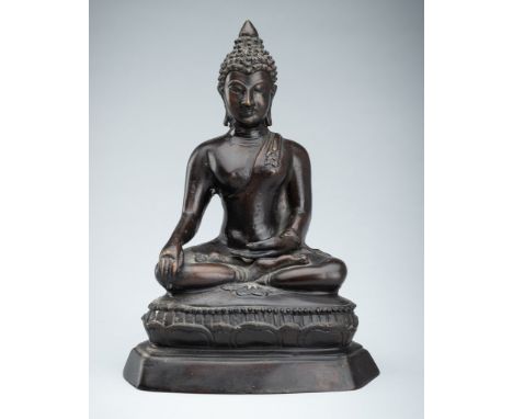 A BRONZE FIGURE OF BUDDHA SHAKYAMUNI, 18TH-19TH CENTURYThailand. Finely cast, seated in dhyanasana on a lotus pedestal with a