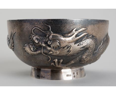 A SILVER 'DRAGON' BOWL, MARK OF WANG HING, LATE 19TH TO EARLY 20TH CENTURYChina, Qing dynasty (1644-1912) or slightly later. 