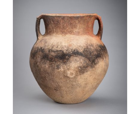 A POTTERY VASE WITH TWIN HANDLES, NEOLITHIC PERIODChina, Neolithic period, 3rd-2nd millennium BC. The vessel with a flat base