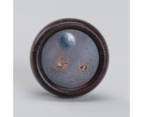 A WOOD KAGAMIBUTA NETSUKE WITH SHIBUICHI PLATE DEPICTING CRABS ON A MOONLIT SHOREUnsignedJapan, 19th centuryThe shibuichi pla